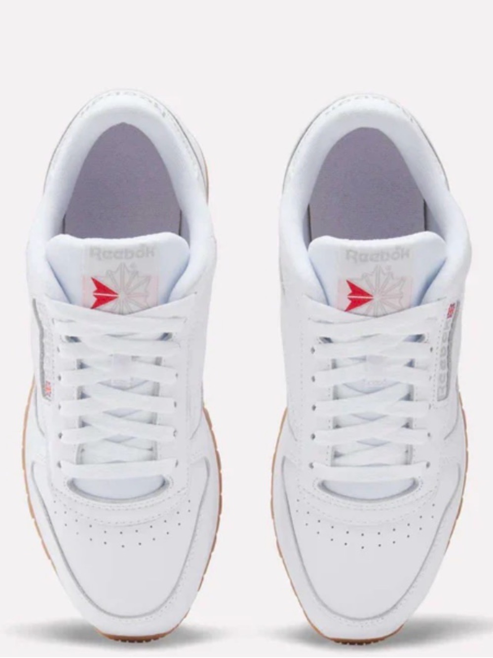 Reebok Women’s White Leather Sneakers with Red Logo Accent